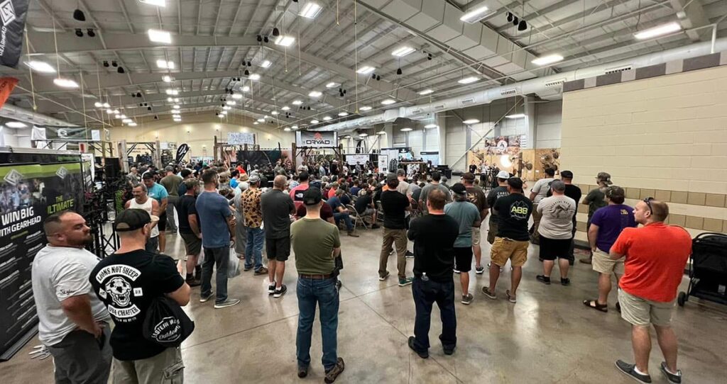 A crowd of people gathers at the 2023 Mobile Hunters Expo.
