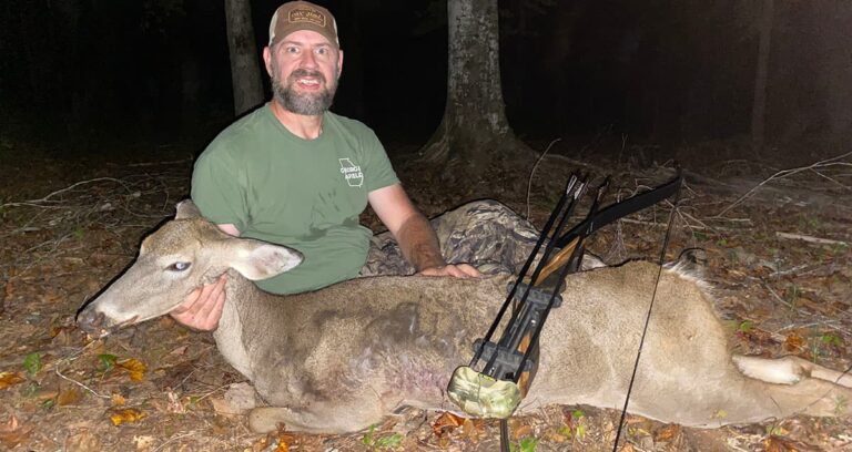 The author with his first deer taken with the Samick Sage recurve.